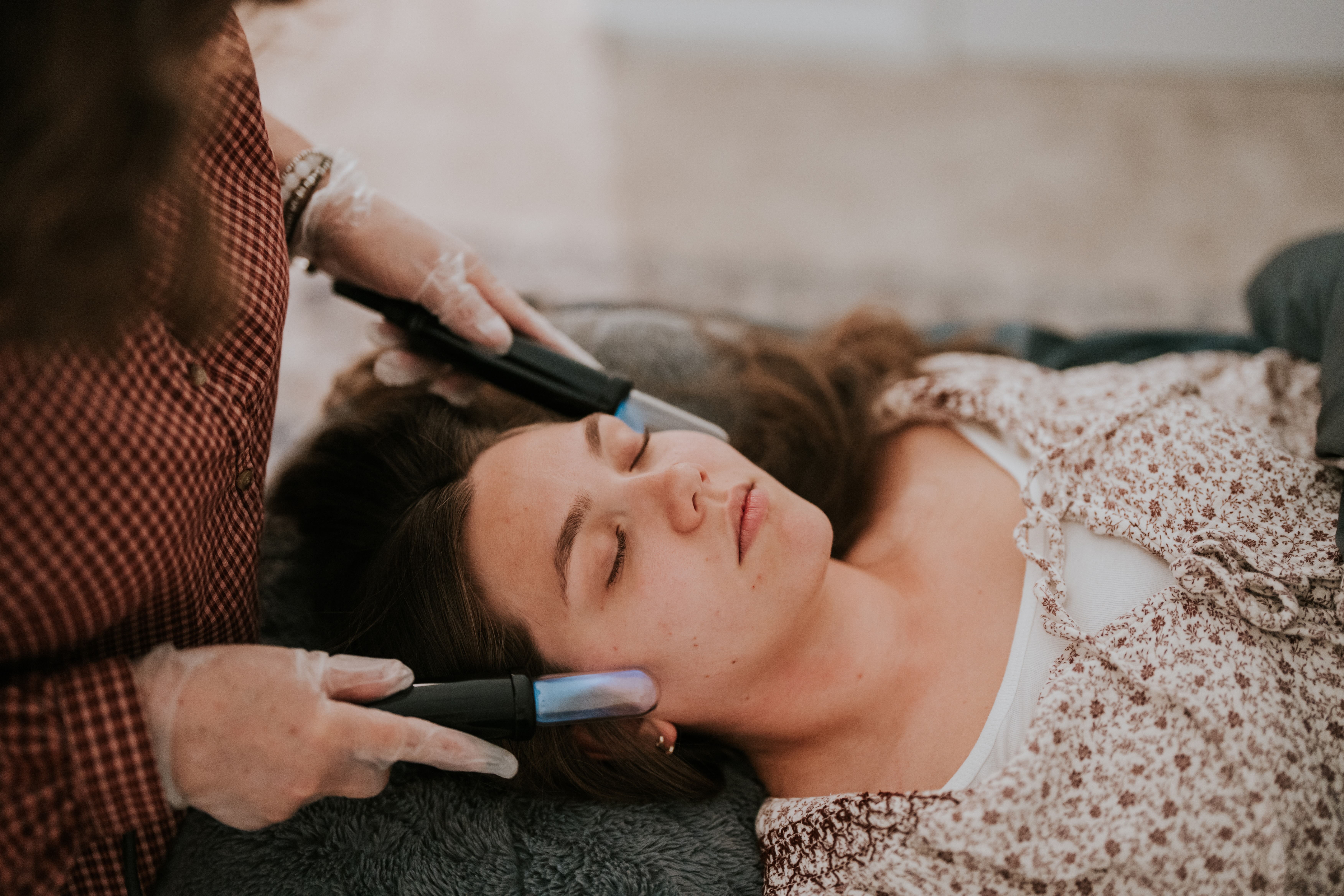 Kelley performing Assisted Lymphatic Therapy face and neck session